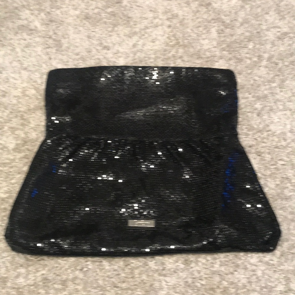 Jessica Simpson - expandable clutch